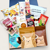 Treats on Repeat gluten-free dairy-free gift box featuring cookies, biltong, chocolate, and snacks. Perfect allergy friendly hamper for gifting NZ wide.