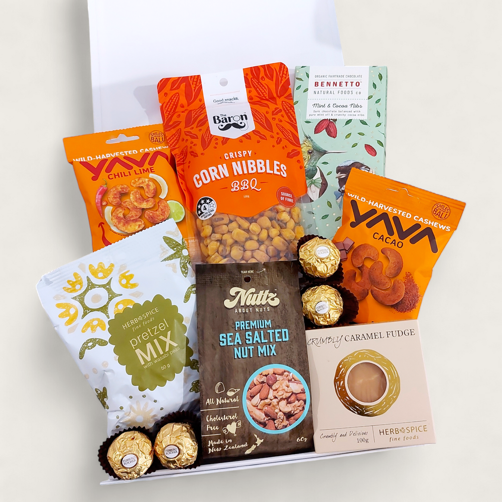 Han.gry gift basket with Nuts, Chocolate, Fudge & Pretzels presented in a modern Gift Box.