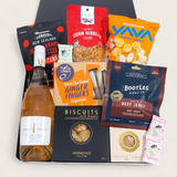 Happy Hour Gift Basket with wine, biscuits, chocolate, fudge, jerky and nibbles presented in a modern gift box.