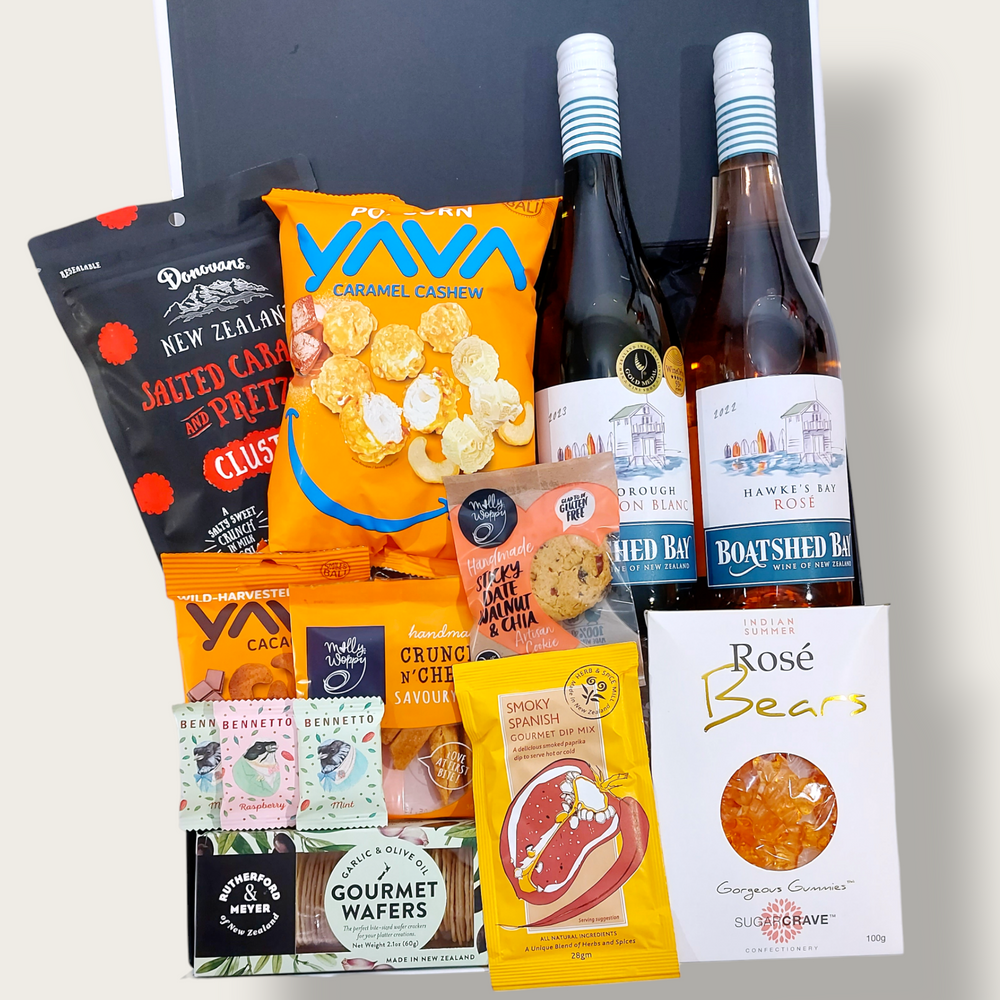 Hot Summer Nights gift hamper with two wines, popcorn, nuts, dip, chocolate & more, presented in a modern gift box.