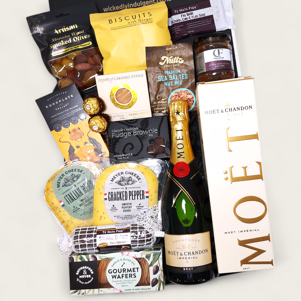 Lets pop bottles gift basket with Moet, cheese, chocolate, olives & more presented in a modern gift box.