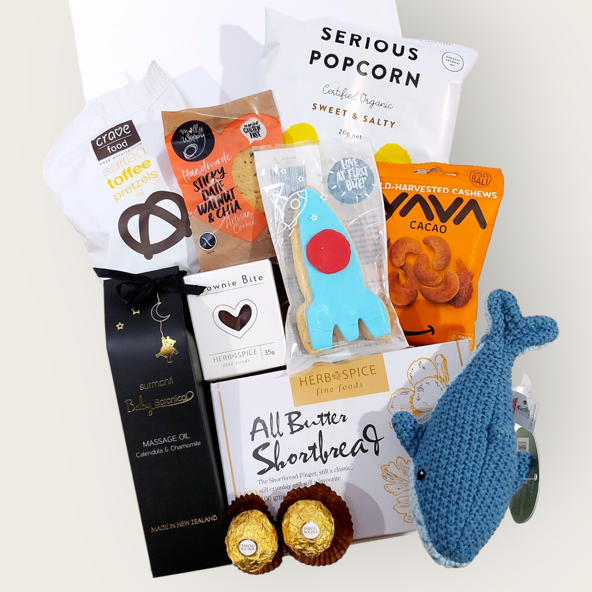 Little Miss or Mister New Baby Gift with lilly & george whale rattle, Surmanti Baby Oil & Yummy snacks.