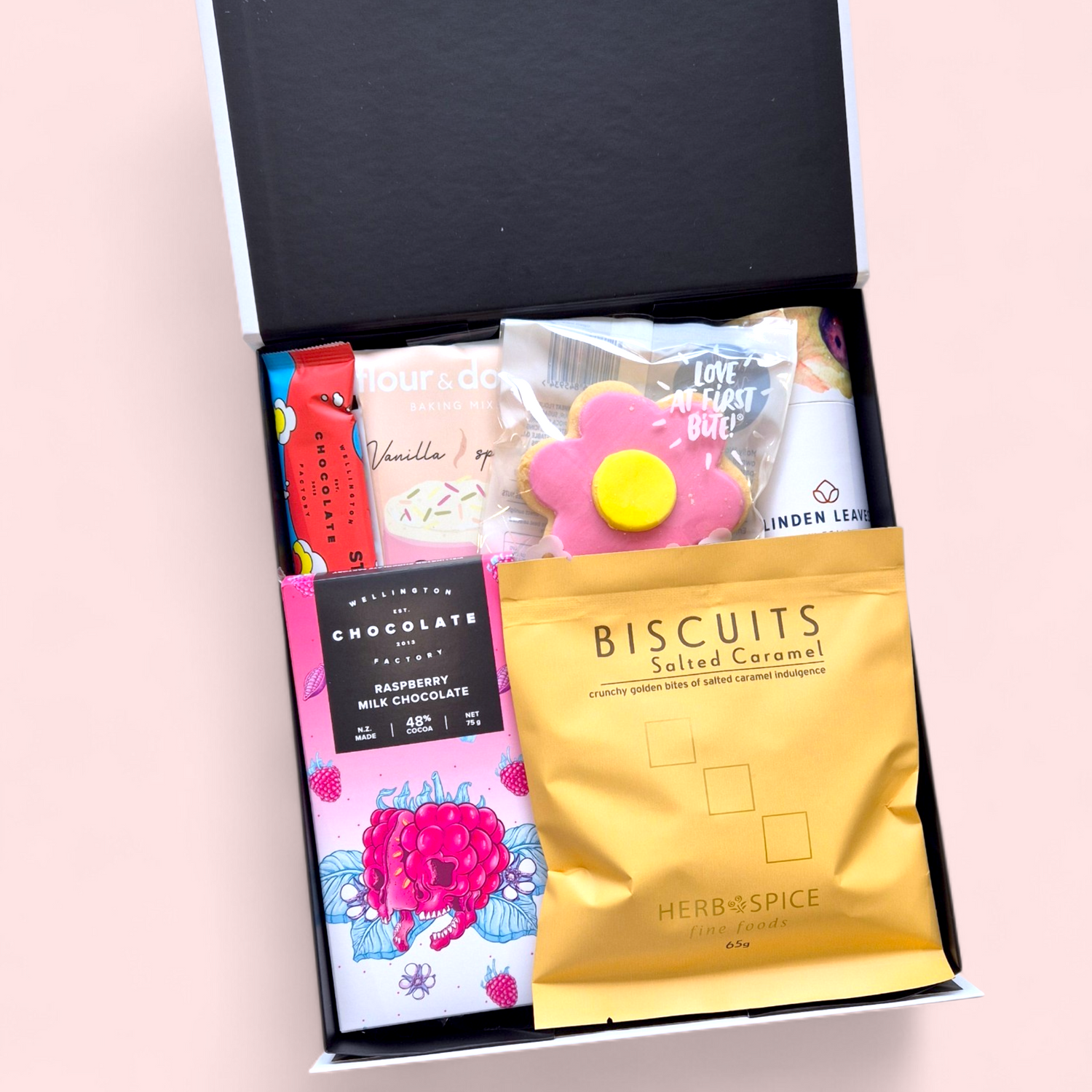 Relaxation gift hamper with bath bomb, cake mix and snacks in luxury NZ gift box