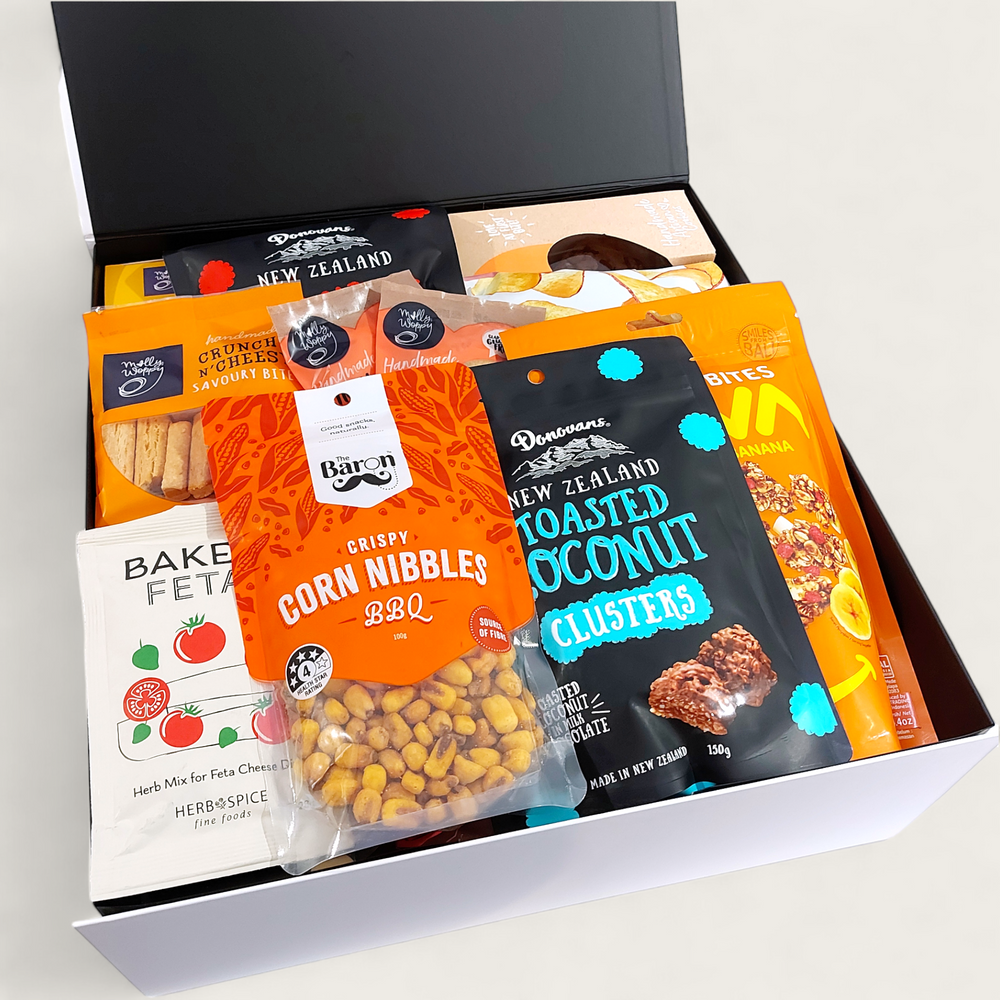 Morish gift box. Large corporate non alcoholic gift hamper with cookies, chocolate, mouse, popcorn, granola & more.