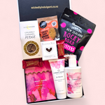 Relaxation gift box for Mum in pink tones with self-care products and chocolates, perfect Mother’s Day gift delivered NZ-wide