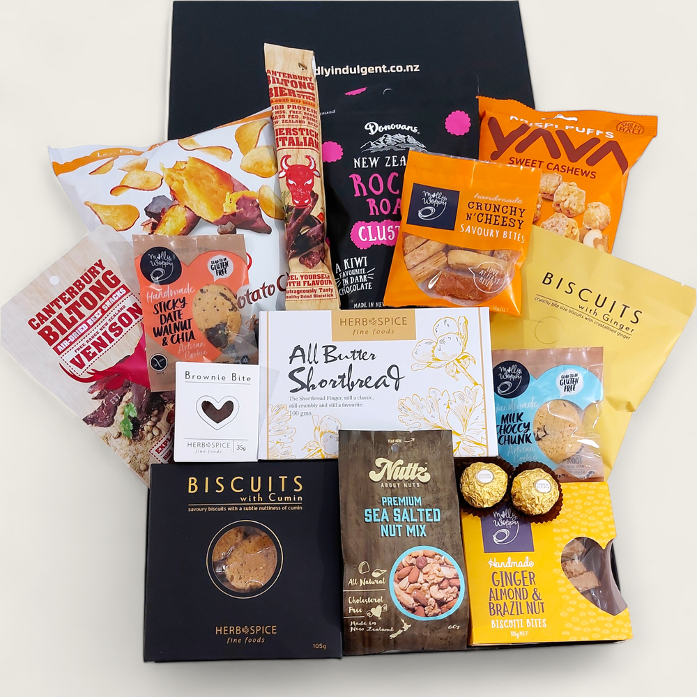 Non alcoholic gift hamper with an assortment of sweet and savoury snacks. Presented in a modern gift box.
