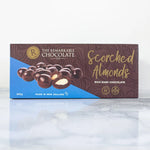 Remarkable Chocolate Co. Dark Chocolate Scorched Almonds 200g in blue and brown packaging, featuring chocolate-covered roasted almonds.