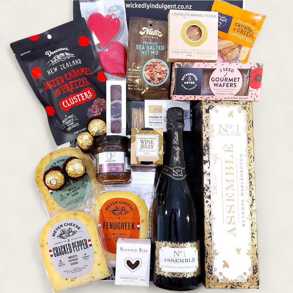 Simply the Best Champagne gift basket with Cheese, Chutney, Chocolate, Nuts & more all presented in a modern Gift Box.