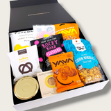 Sweet tooth gift hamper with passionfruit lemon curd, popcorn, granola bites, Russian fudge, chocolates and more, all presented in a modern gift box.