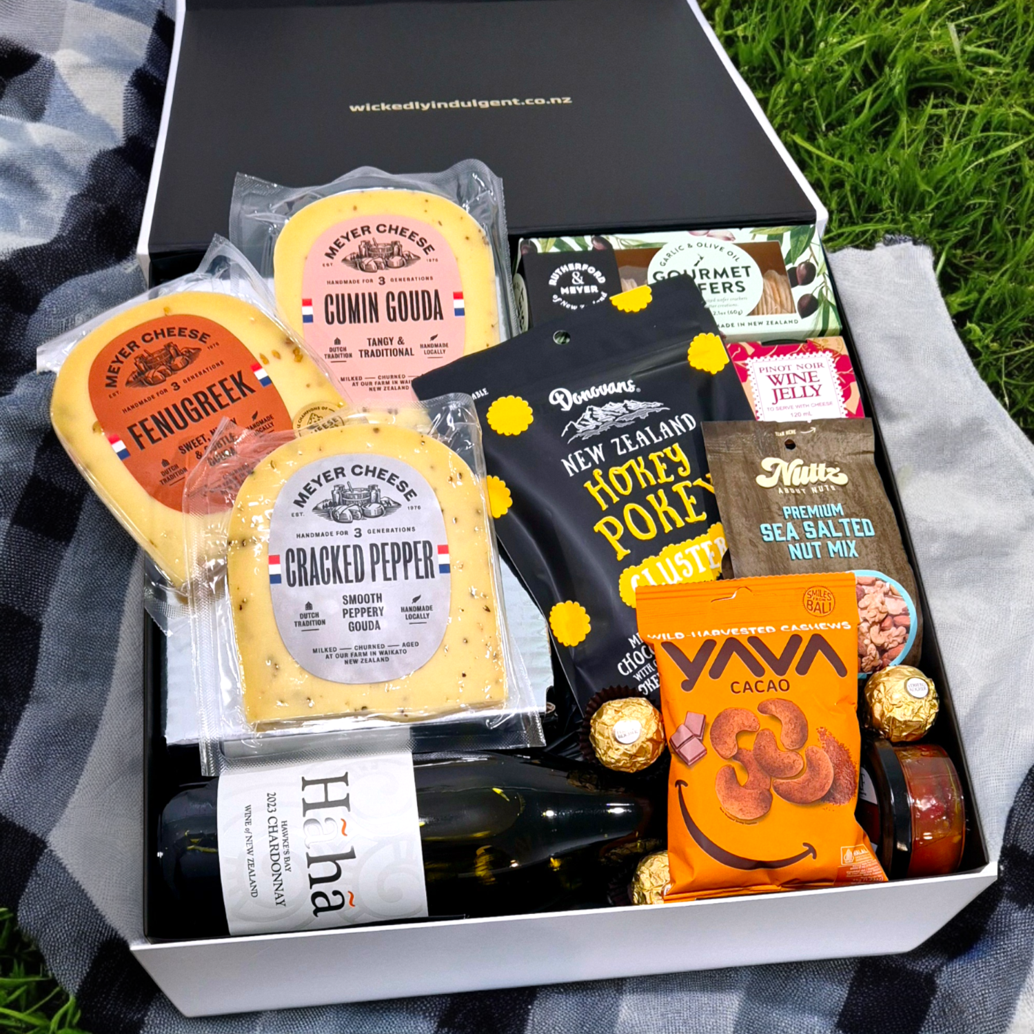 Tasty Treats Gift Basket with Cheese & Condiments, Wine, Nuts & Chocolate presented in a Gift Box