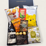 Kraken rum gift hamper with kumara chips, brownie, nuts, Ferrero Rocher, and gourmet snacks in black and white gift box