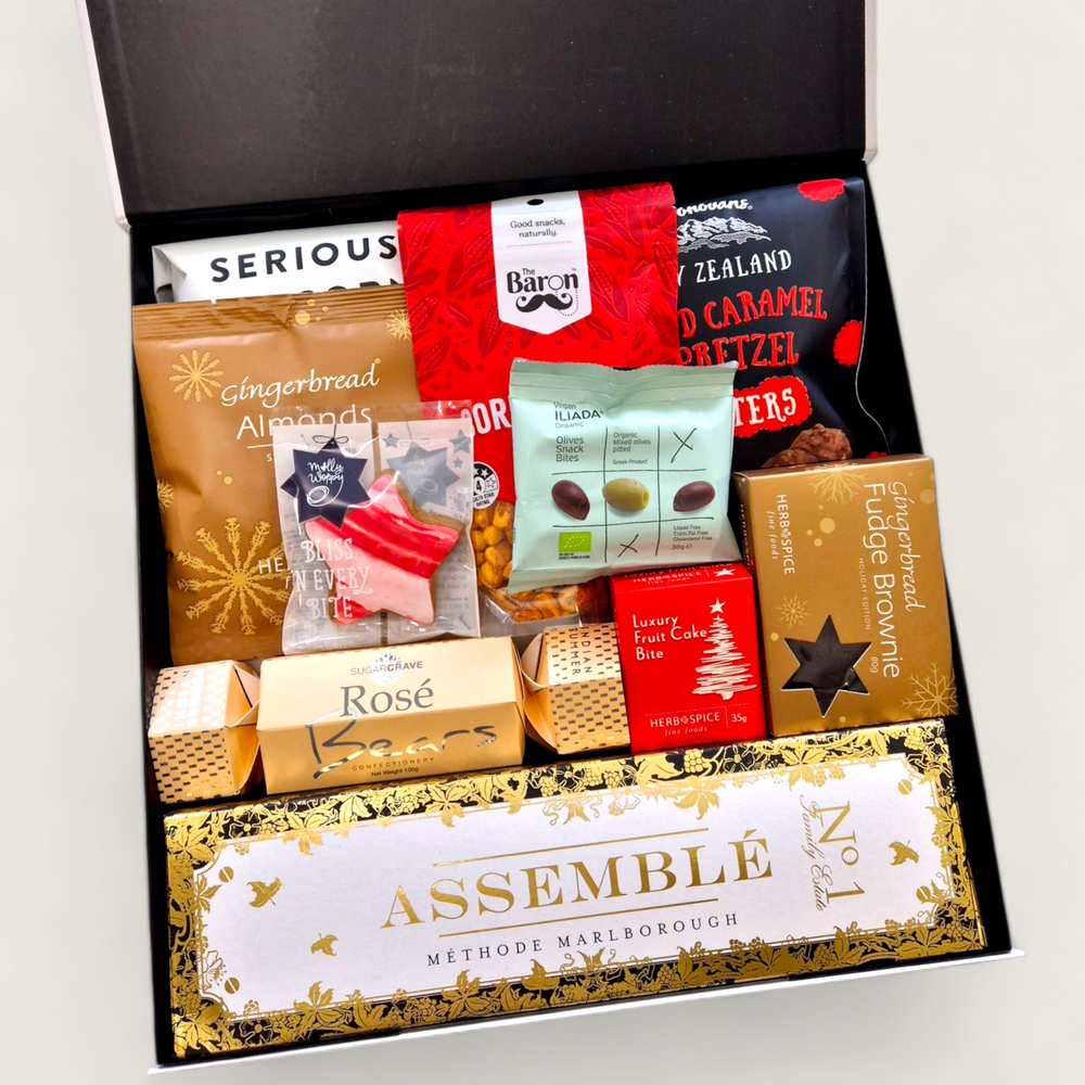 Festive Xmas gift hamper with champagne and festive indulgences.