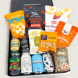Tools Down gift hamper with craft beer, nuts, chocolate, pretzels and popcorn all presented in a modern gift box.