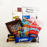 3pm Pick Me Up gift hamper with hot chocolate, marshmallows, M&M's, Popcorn and cookies presented in a modern gift box.