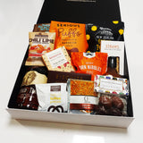 Big Buffalo Gift Box with Buffalo Trace Bourbon, cumin biscuits, BBQ Rub, and more. Presented in a modern Gift Box.