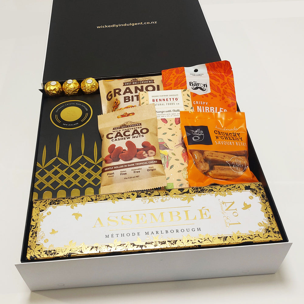 Celebrate Good Times Champagne & Room Diffuser House warming gift basket presented in a modern gift box.