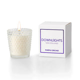 Downlights purple orchid mini candle, the perfect gift basket add on.