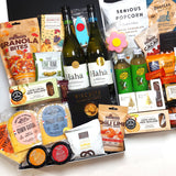 The Crowd Pleaser Hamper includes treats for everyone to savour, with a delicious range of wine, non alcoholic drinks, cheeses, condiments, nuts, chocolate & more.