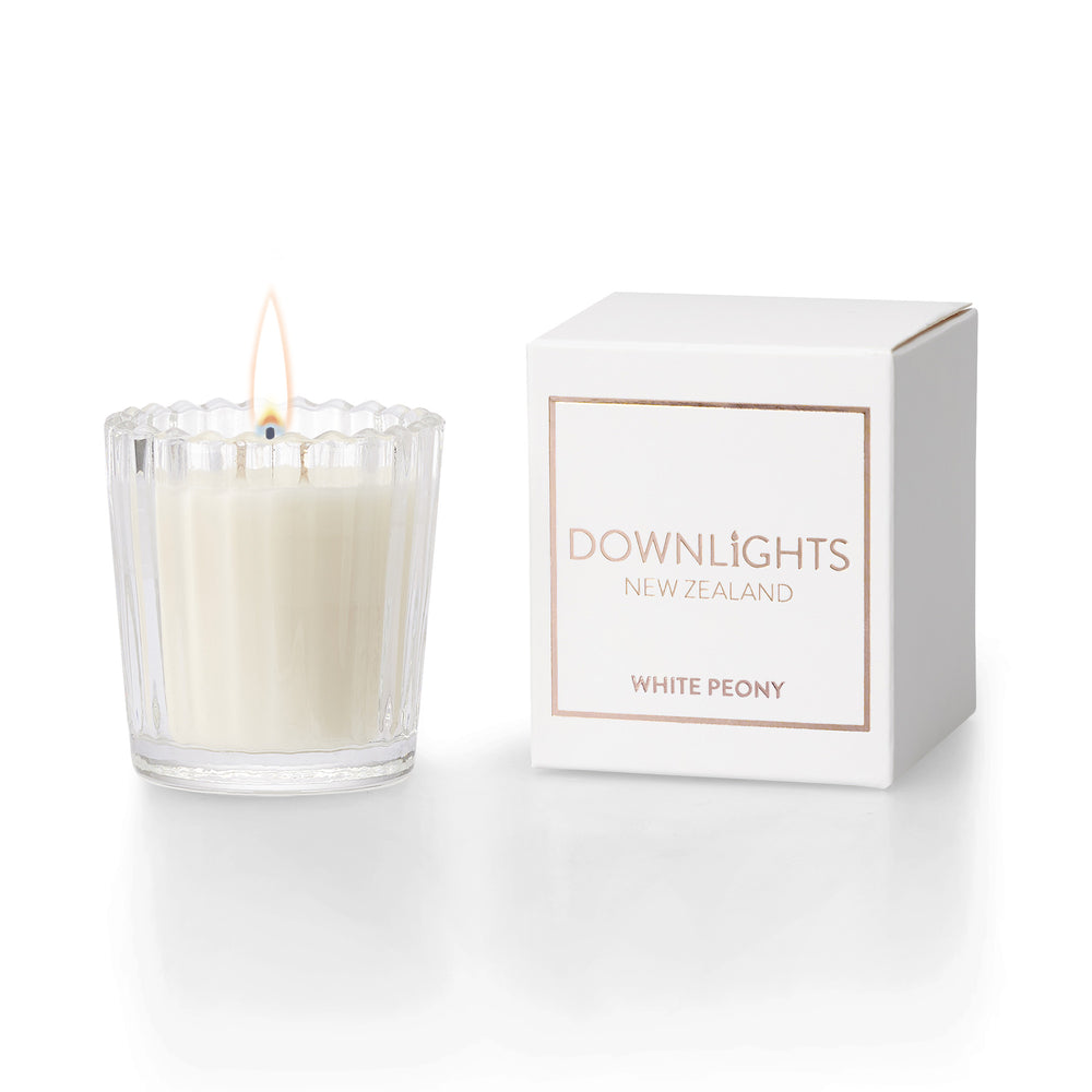 Downlights white peony mini candle, the perfect gift basket add on.