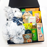 Gluten & Dairy Free Baby gift box with plush bear soft toy, chocolate, nuts, jerky, fizzy drink and Tea.