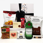 Alcoholic gift basket with Kraken Rum, chocolate, fudge, chips and more.