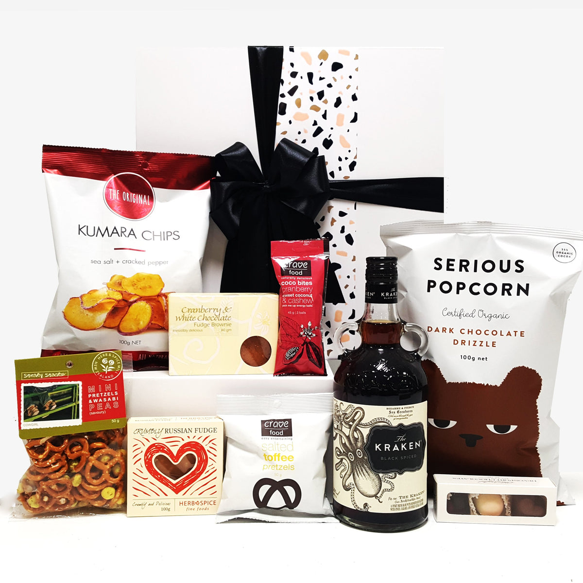 Alcoholic gift basket with Kraken Rum, chocolate, fudge, chips and more.