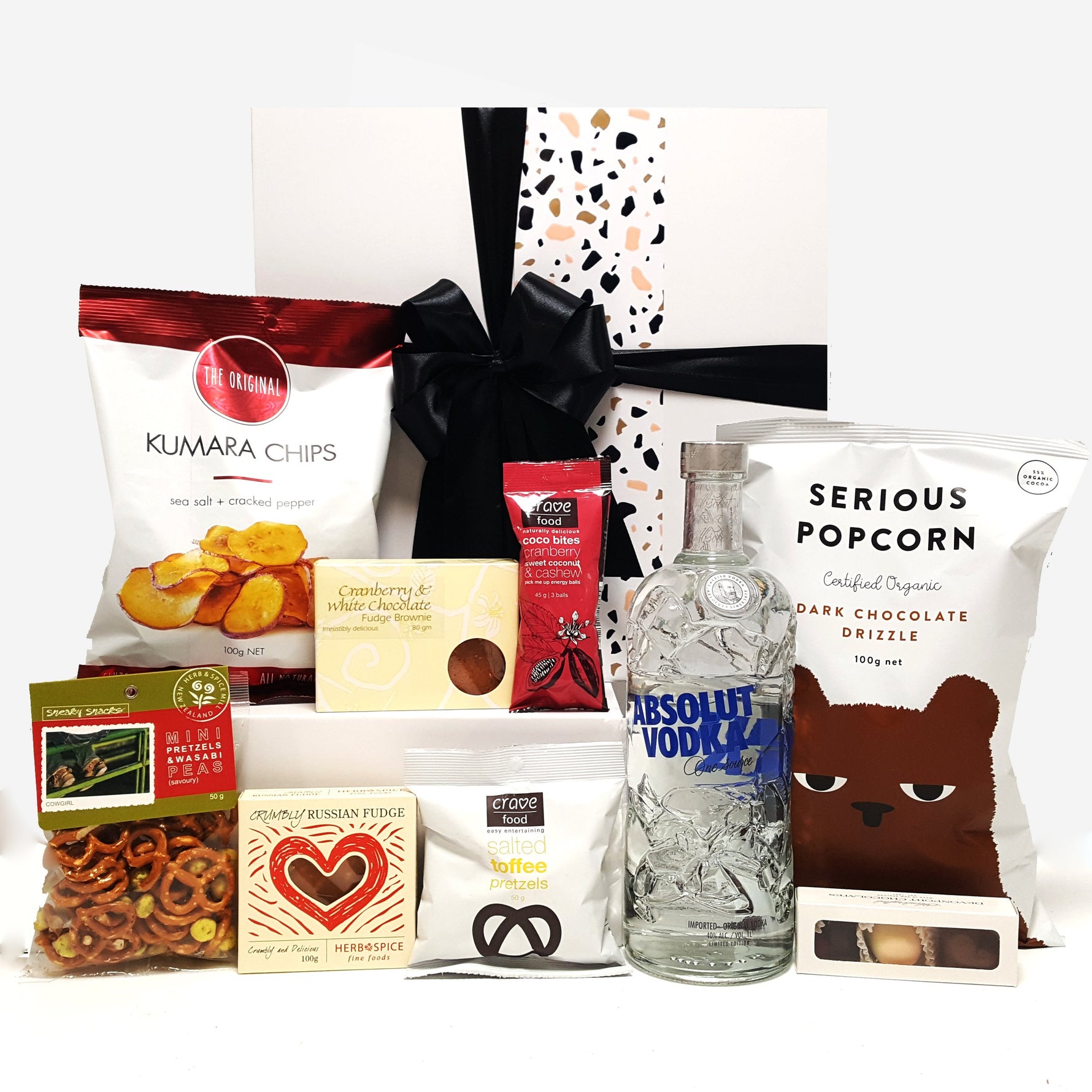 Alcoholic gift basket with Absolut Vodka, chocolate, fudge, chips and more.