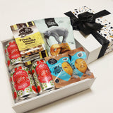 Cider-lious gift box comes with three ciders, cookies, pretzels and Nuts.