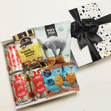 Cider-lious gift box comes with three ciders, cookies, pretzels and Nuts. 