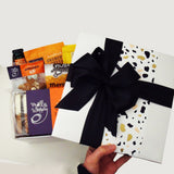 Ginger Ninja gift basket with alcoholic ginger beer, white choc ginfer fingers, gingerboy, nuts and dip all presented in a modern gift box.