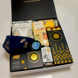 Gold Luxe Gift Box with Scarf, Room Diffuser, Candle, Chocolate & more. All presented in a modern gift box.