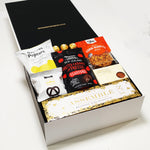 Make it Pop champagne gift basket and nibbles.