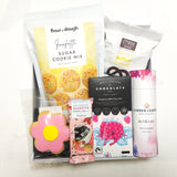 Me time gift basket with Linden Leaves bath bombs, Chocolate, sugar cookie mix & nibbles. Presented in a modern gift box.