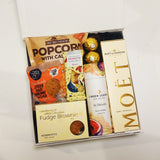 Petite Pleasure gift basket with Moet Champagne, Linden Leaves Bath Bombs and sweet treats.