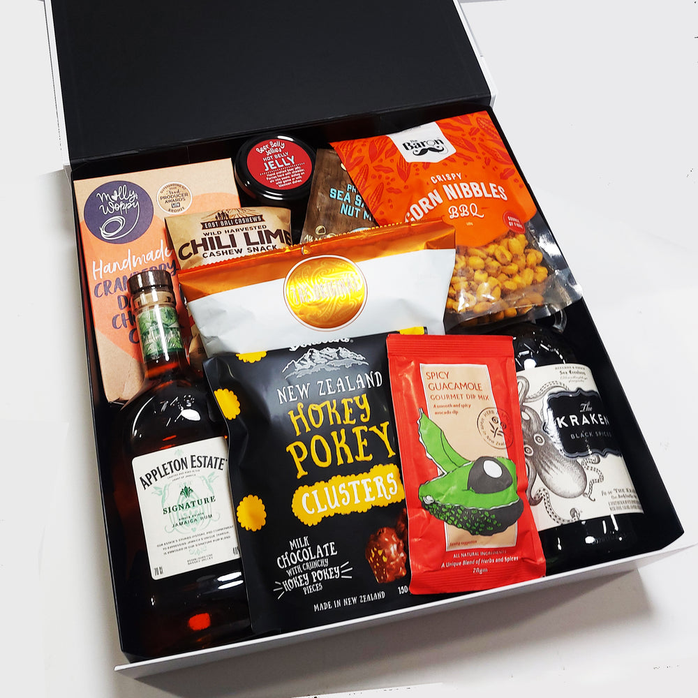 Rum gift hamper with Appletons & Kraken rum, chips, nuts, chocolate, beer infused jelly and more all presented in a modern gift box.