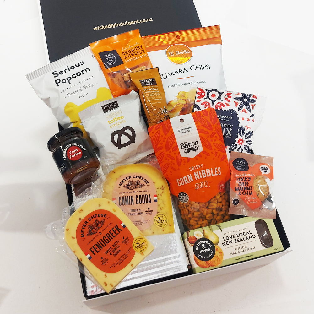 The grazing gift box with cheese, tamarillo chutney, chips, popcorn, pretzels & more.
