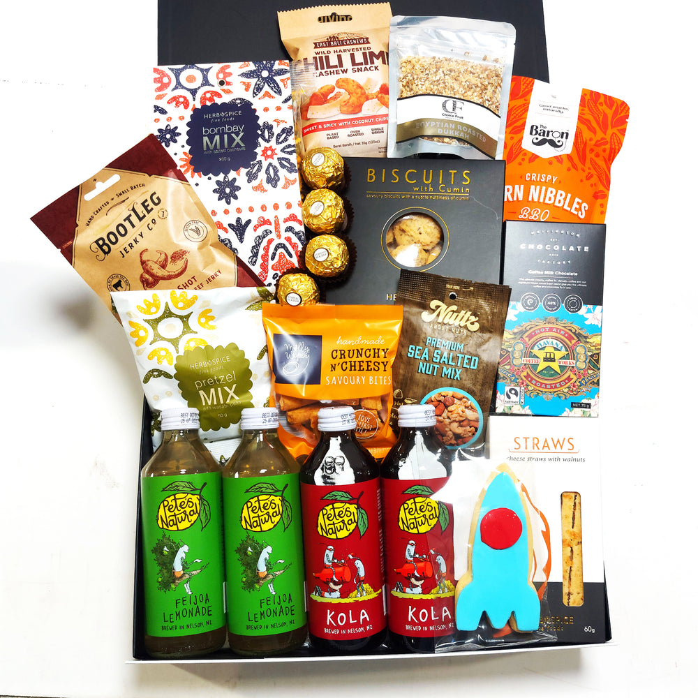 Non Alcoholic gift basket with drinks, chocolate, dukkah, jerky and more. Presented in a modern gift box.