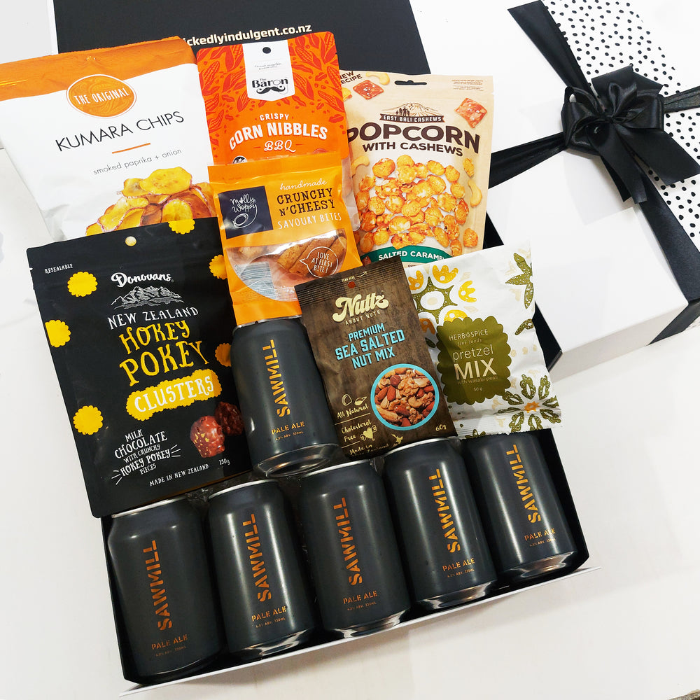 Tools Down gift hamper with craft beer, nuts, chocolate, pretzels and popcorn all presented in a modern gift box.