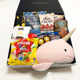 Underwater snacker gift basket with Lily & George Narwhal Soft Toy, Beef Jerky, Nuts, Biscuits & Nibbles. Presented in a modern Gift Box.