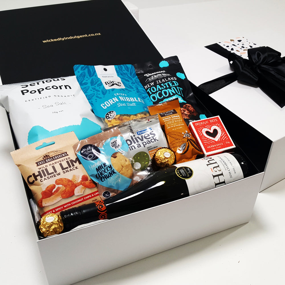 Wine O'Clock gift basket with Wine, Bliss Balls, Chocolate, nuts & Popcorn all presented in a modern gift Box.